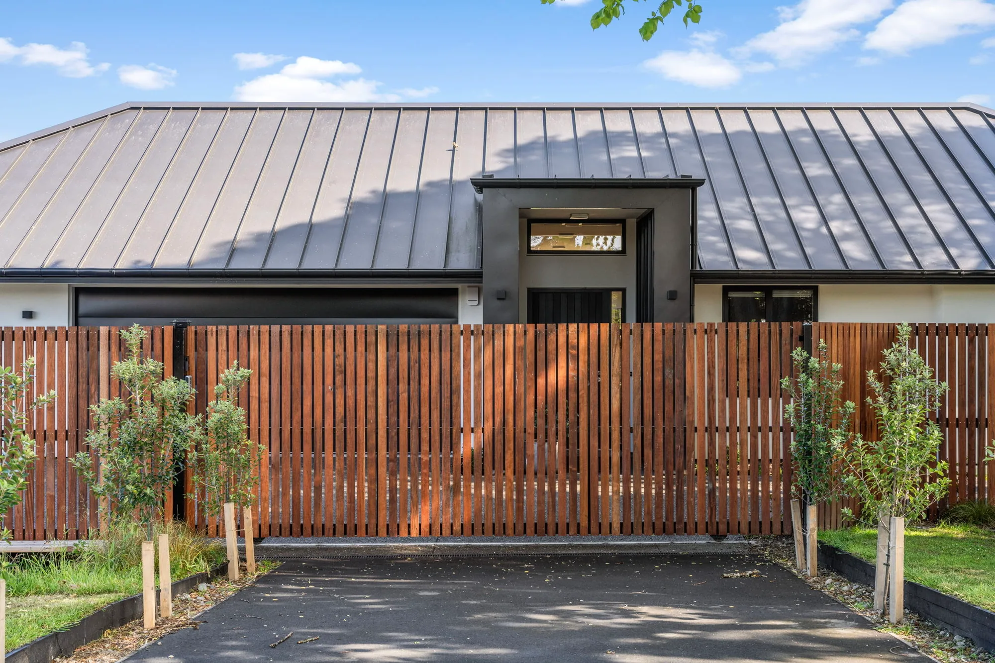 Timber slat fence with natural finish